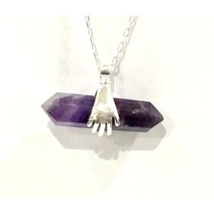 Hands Holding Chevron Amethyst Two Pointed Pendent With Chain